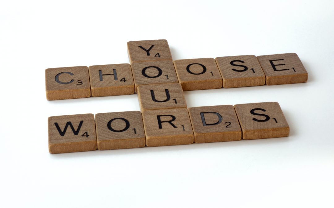 Scrabble tiles spelling Choose Your Words