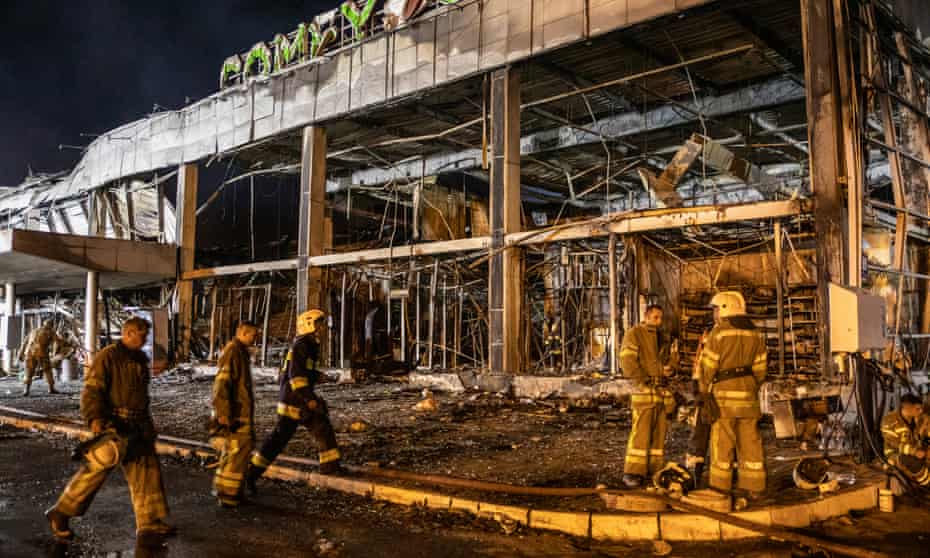 Russian missile strike on a shopping centre in Kremenchuk.