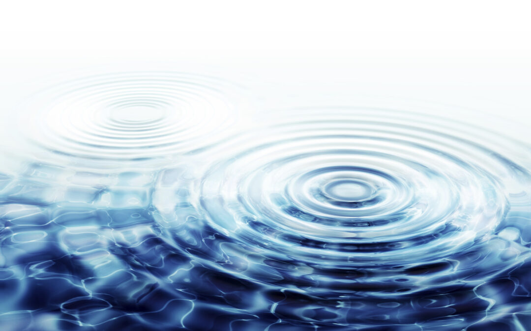 Crystal clear water with ripples - a stirring of water